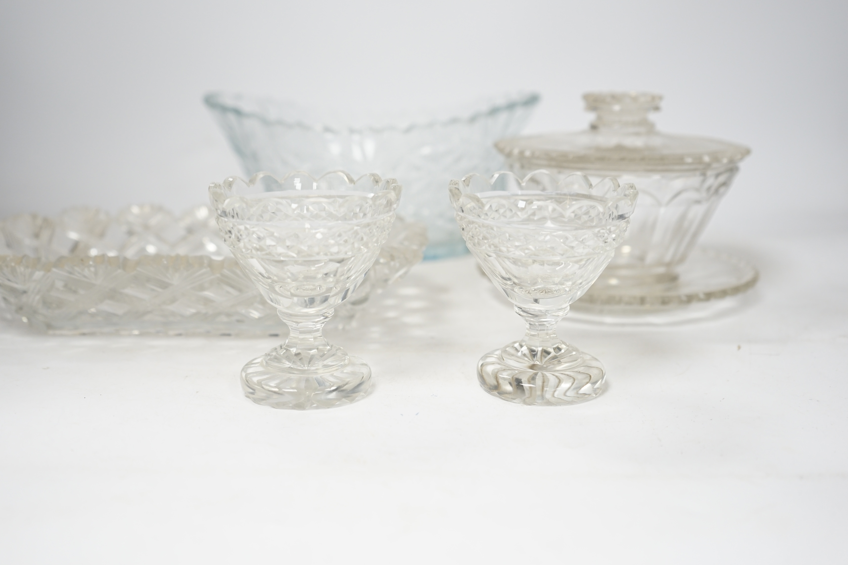Six pieces of 19th century cut glass including a bon bon dish and a pair of glasses, largest 23cm. Condition - poor to fair, some chips